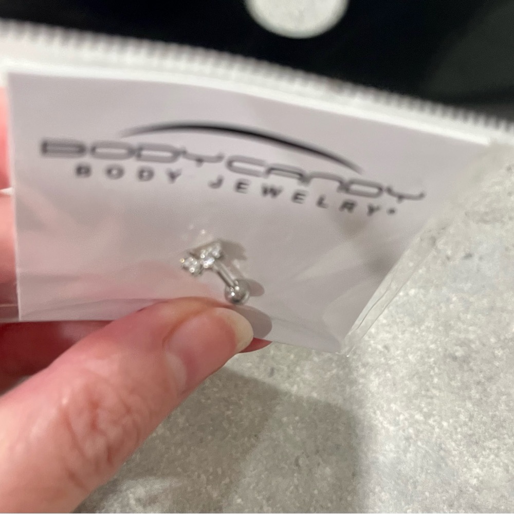 New paw print body jewelry. New Never worn. For cartridge, conch, or tragus.16mm